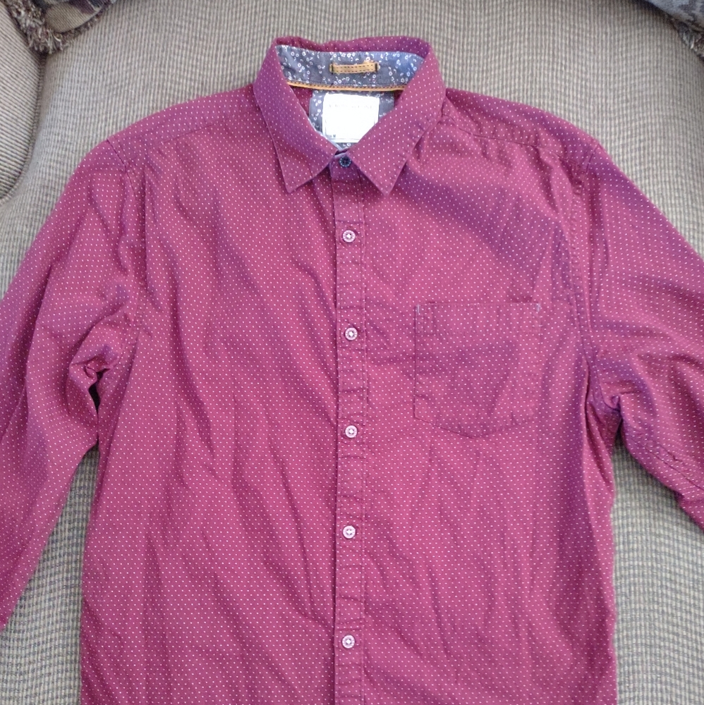 Men's red velvet button up long sleeve dress shirt with tiny white dot designs.